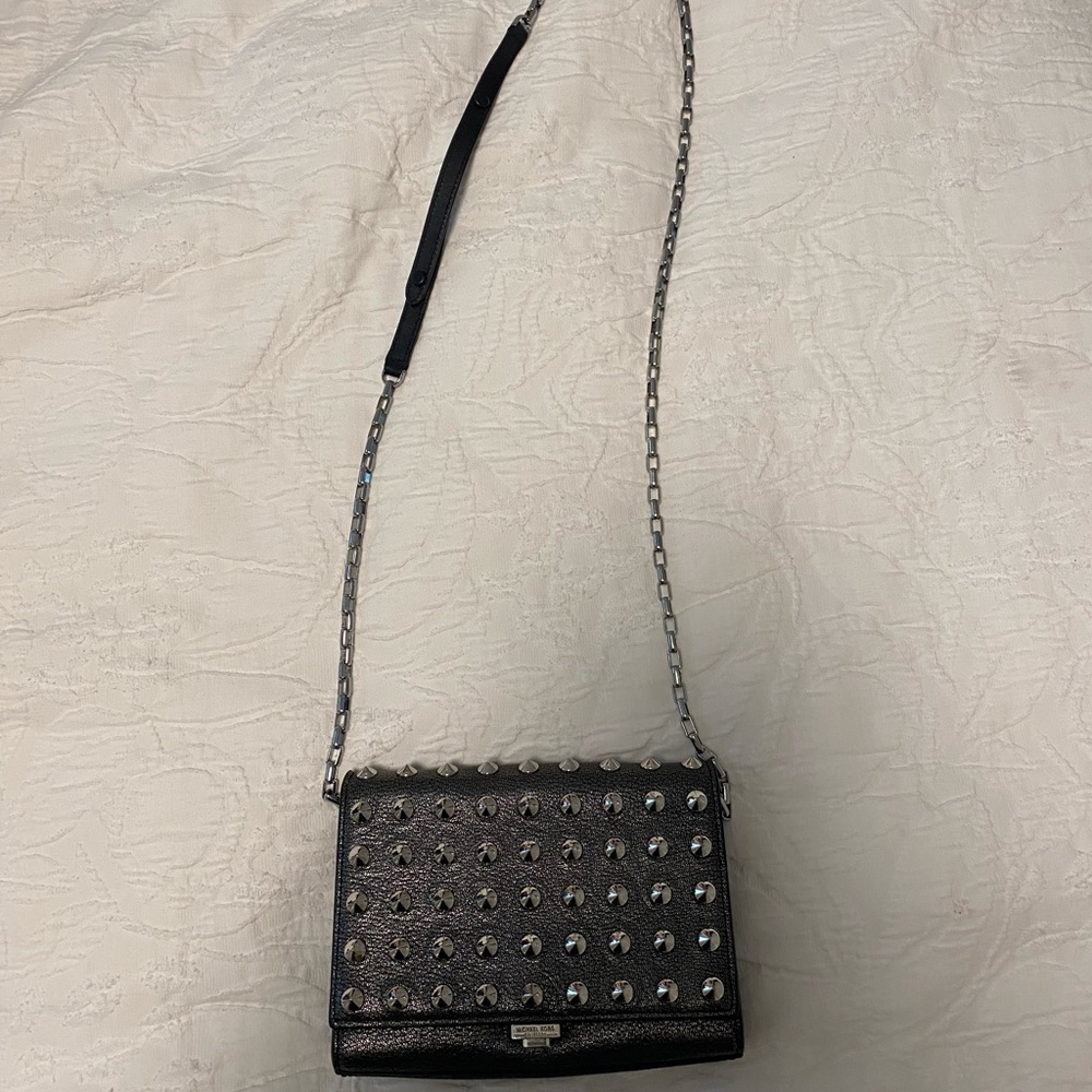 Lightly worn Michael Kors spike purse. Cute and spunky